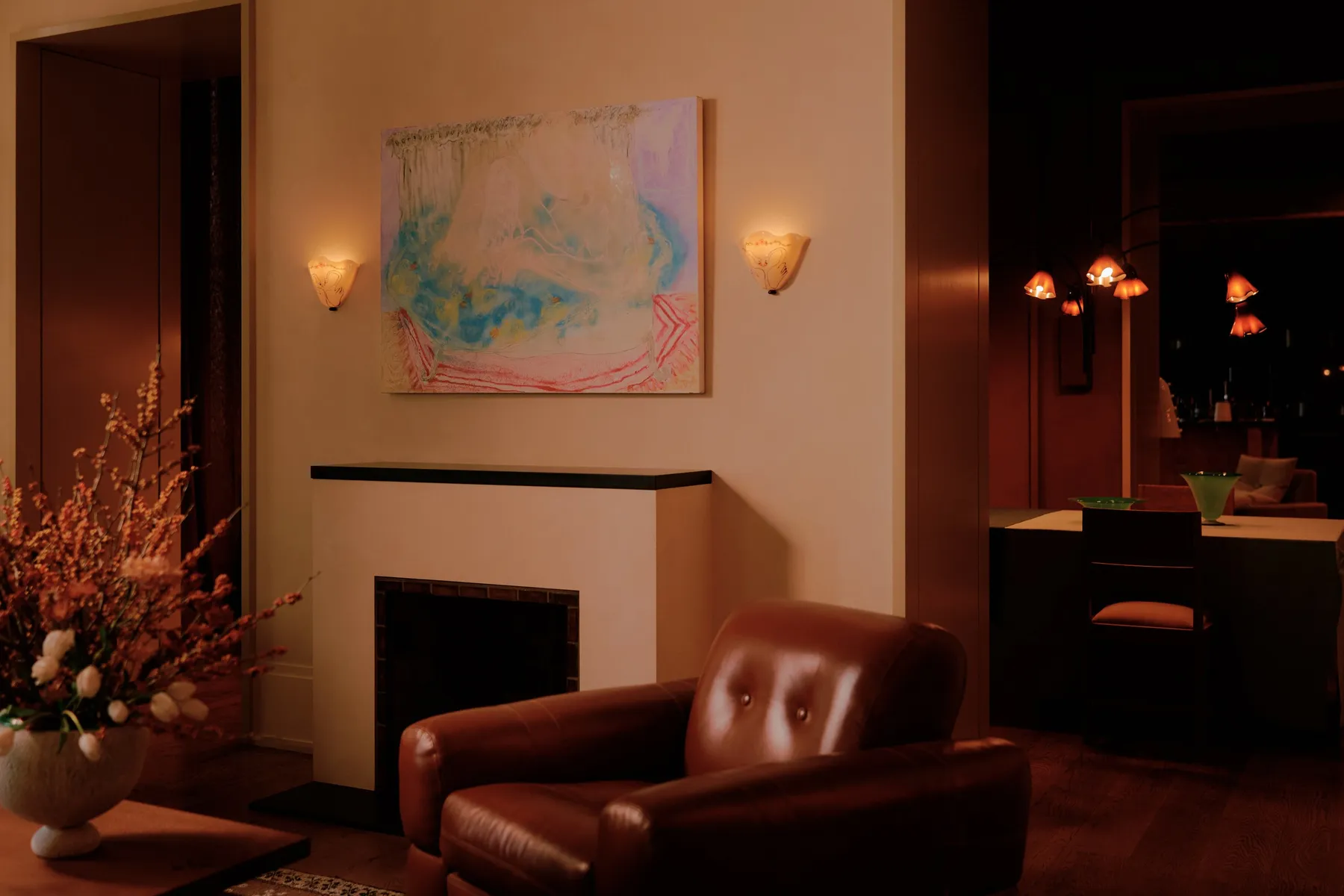 Painting over fireplace in living room 