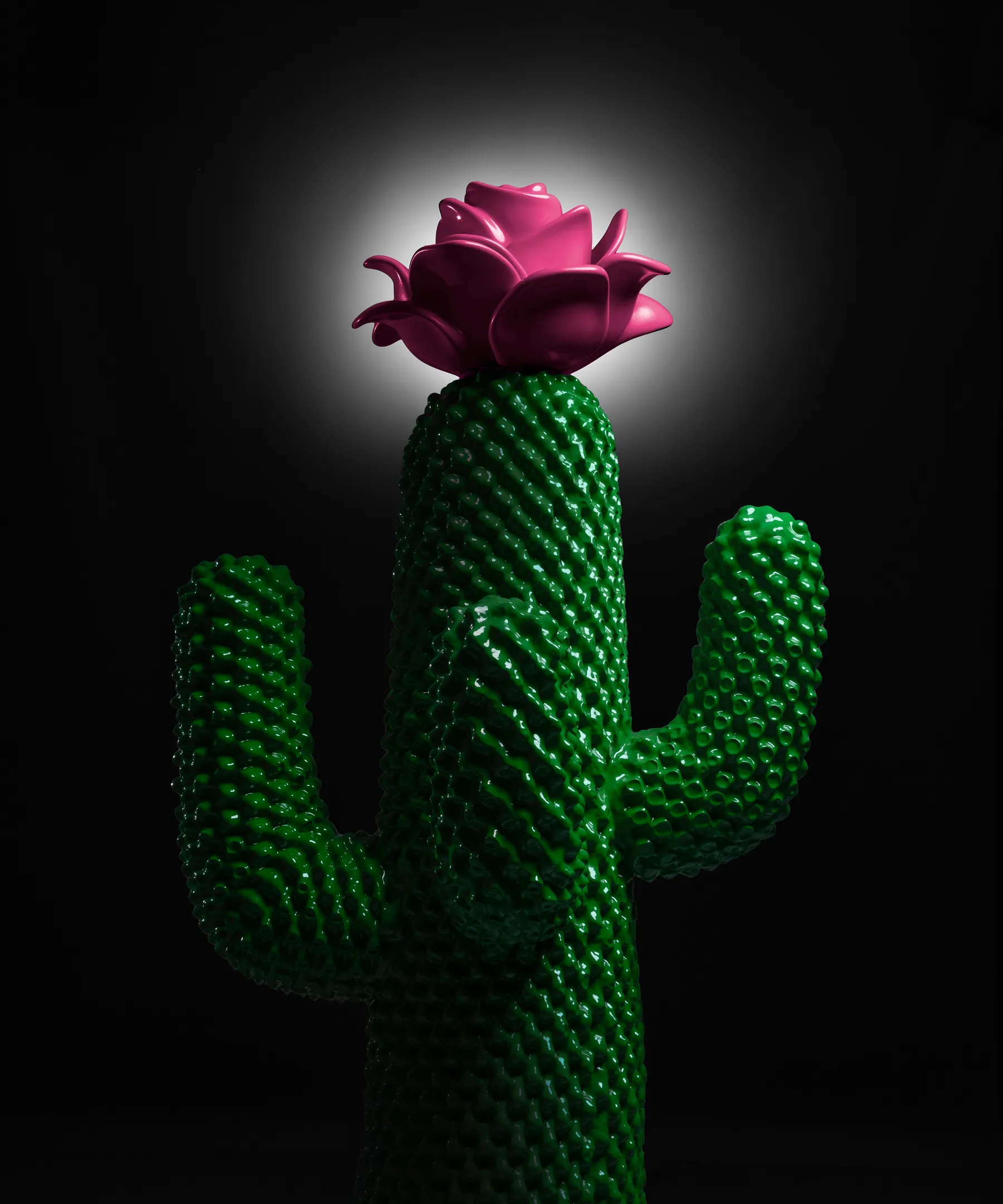 green cactus coat rack with pink flower on top